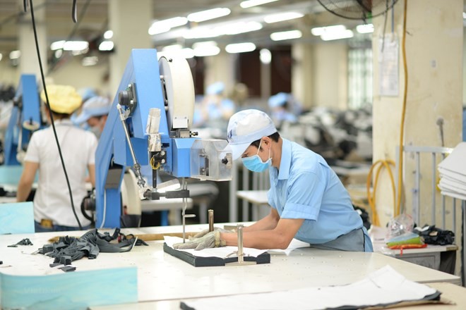 The production of garments for export. (Photo: Vietnam+)