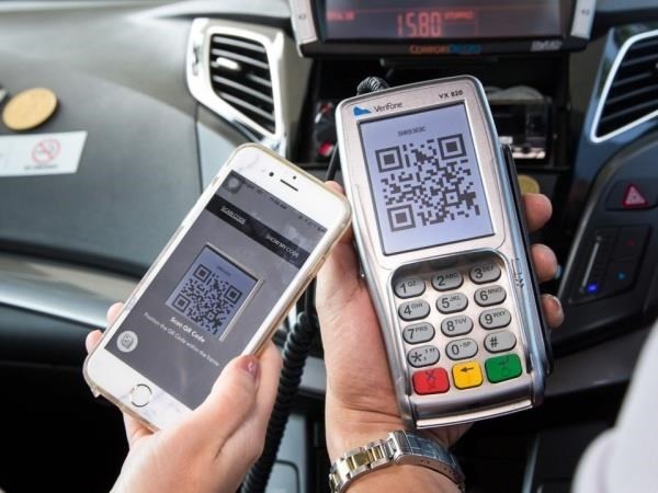 Payment with QR code scanning is secure. (Photo: VietnamPlus)