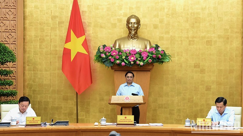 Prime Minister Pham Minh Chinh chairs the cabinet meeting on August 5 (Photo: NDO)