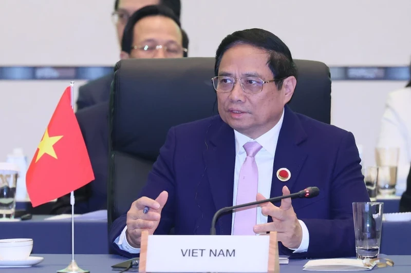 PM Pham Minh Chinh attends the closing ceremony of the Commemorative Summit. (Photo: VNA)