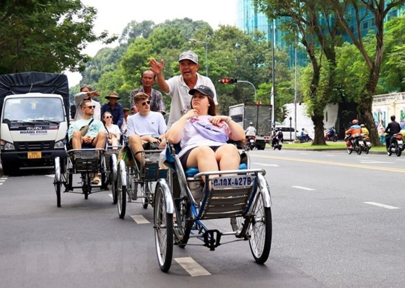 Foreign tourists visit Ho Chi Minh City. (Photo: VNA)