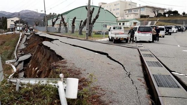 A road is damaged by the earthquake in Wajima city, Japan's Ishikawa perfecture on January 1. (Photo: VNA)