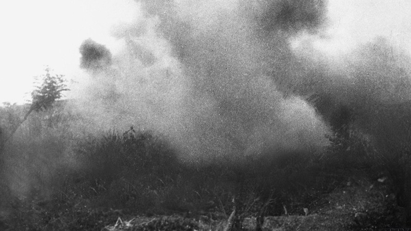 The enemy’s positions on Him Lam Hill hit by the Vietnamese artillery are on fire. These positions on the hill were destroyed on March 13, the opening day of the campaign. (Photo: VNA)
