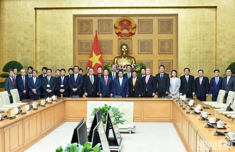 PM Pham Minh Chinh and delegates at the working session. (Photo: NDO)
