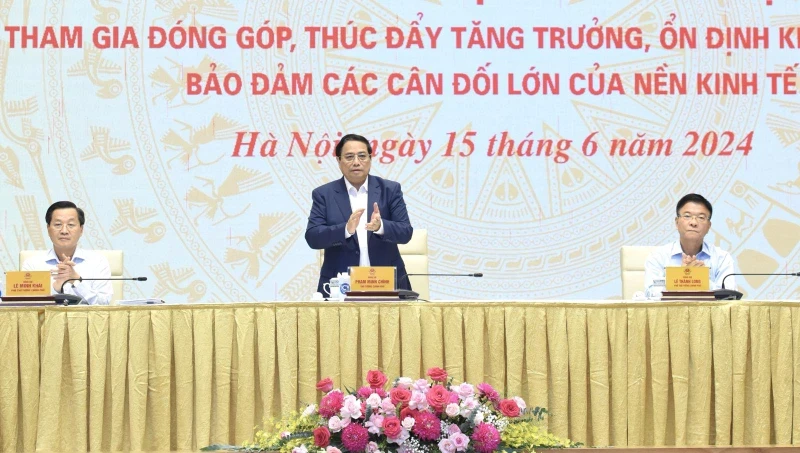 Prime Minister Pham Minh Chinh speaking at the meeting with SOEs' leaders (Photo: NDO)