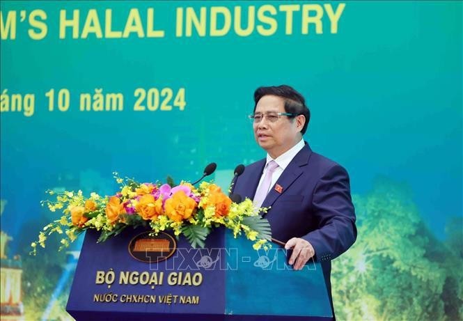 Prime Minister Pham Minh Chinh speaks at the conference on October 22. (Photo: NDO)