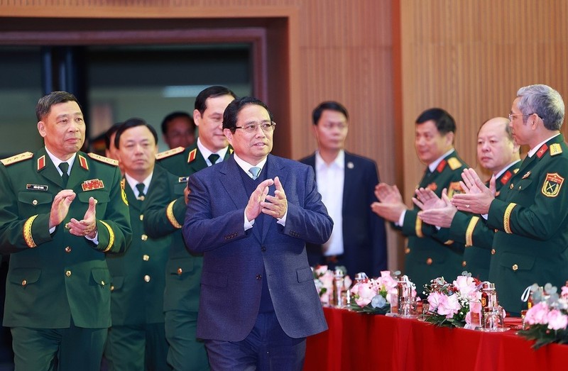 PM Pham Minh Chinh visits the National Defence Academy on December 12. (Photo: VNA)