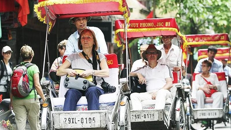 Foreign visitors in Hanoi.