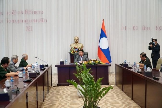 Lao General Secretary and President Thongloun Sisoulith at the meeting. (Photo: VNA)