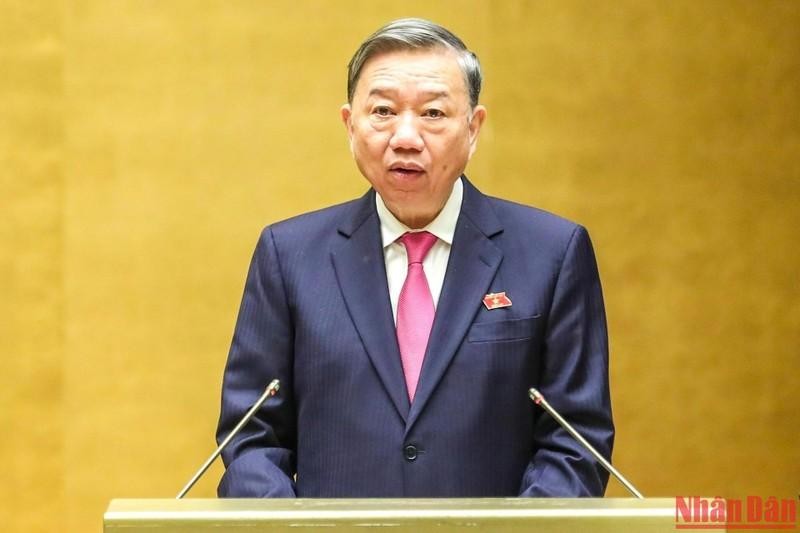 Minister of Public Security To Lam speaks before the National Assembly on November 7. (Photo: Duy Linh)