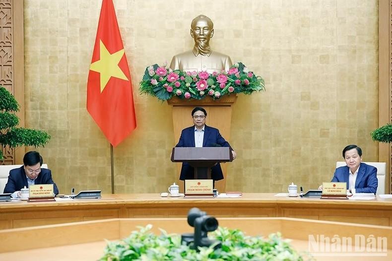 Prime Minister Pham Minh Chinh speaks at the meeting. (Photo: Tran Hai)