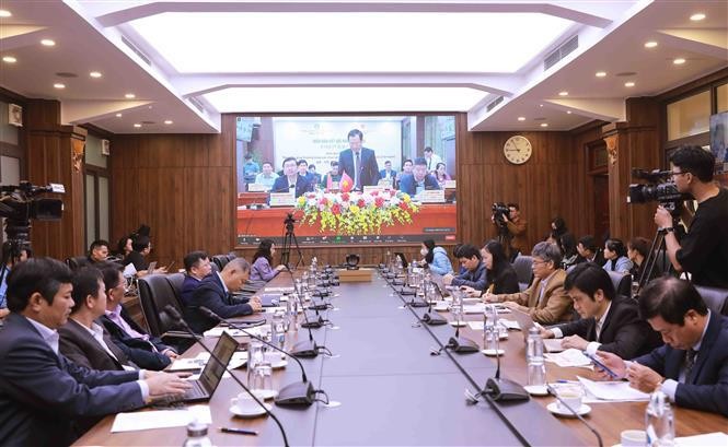 Delegates at an agricultural product connection forum hich focused on seeking ways to promote farm produce trade between Vietnam and China. (Photo: VNA)