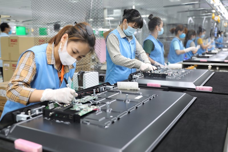 Manufacturing electronic parts at an industrial park in Quang Ninh Province.