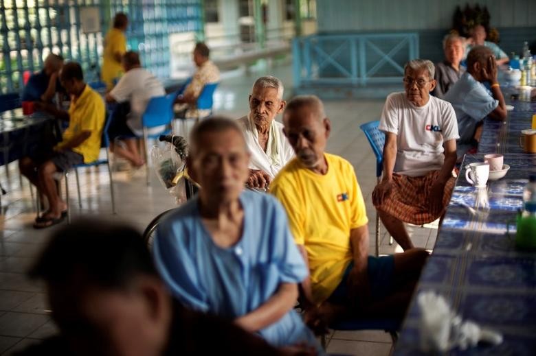Elderly people gather before their breakfast at Bangkhae Home Foundation in Bangkok, Thailand, April 27, 2016. REUTERS/Athit Perawongmetha