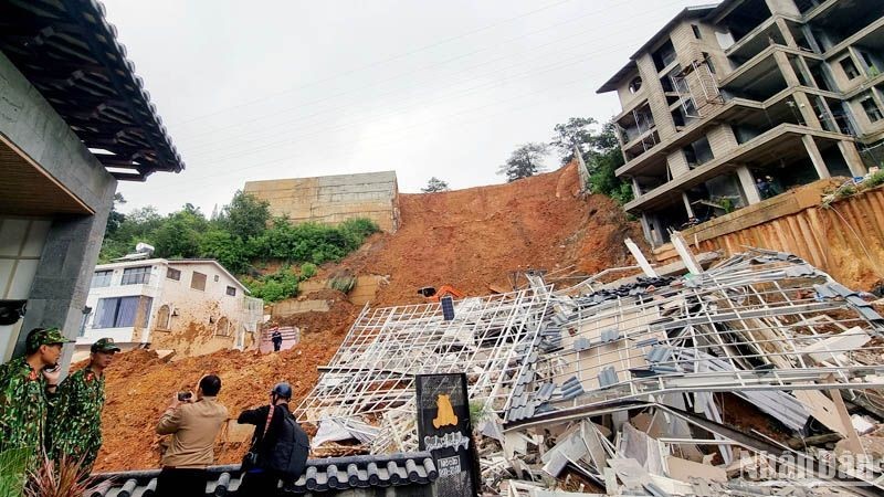 The June 29 landslide buried two people, injured some others, and destroyed houses.
