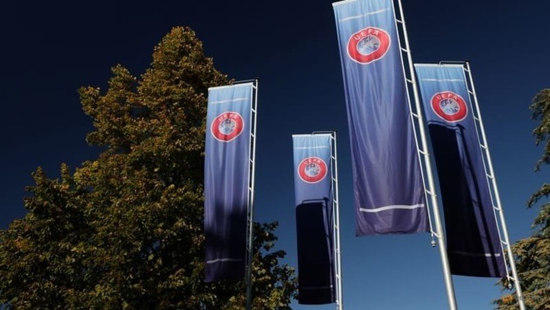 Flags with UEFA logo are seen outside of the Union of European Football Associations headquarters in Nyon, Switzerland, October 5, 2022. (Photo: Reuters)