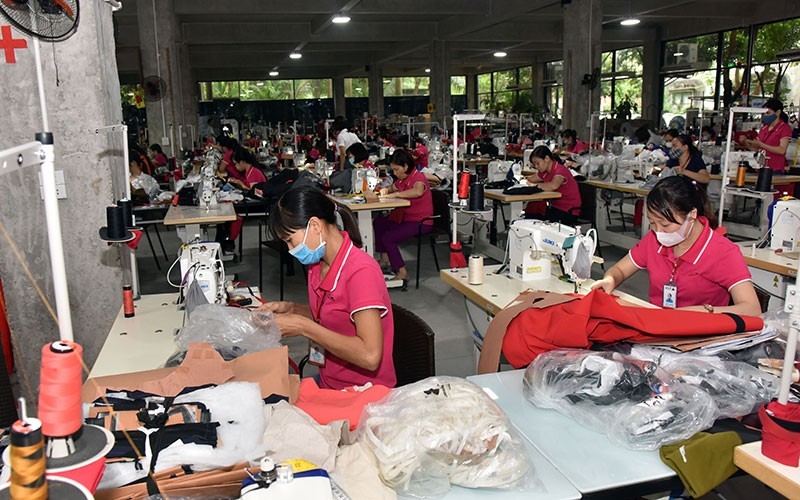 Manufacturing sportswear for export at MXP in Thai Binh Province. (Photo: Dang Duy)