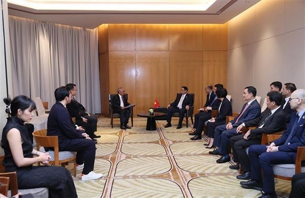 The meeting between PM Pham Minh Chinh and leaders of major Indonesian enterprises in Jakarta on September 4. (Photo: VNA)