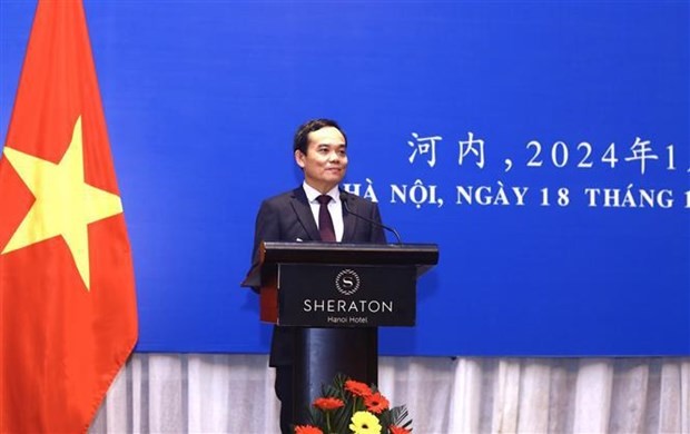 Deputy PM Tran Luu Quang delivers a speech at the ceremony in Hanoi on January 18. (Photo: VNA)