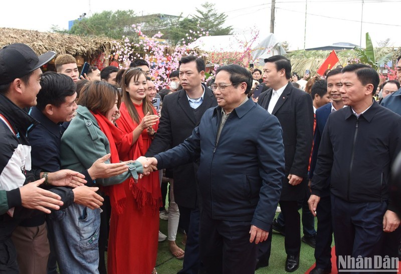 Prime Minister Pham Minh Chinh meets with workers in Thanh Hoa province. (Photo: NDO/Tran Hai)