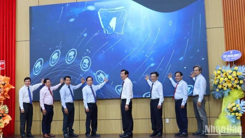 At the launch ceremony of the portal https://checkinangiang.vn, and the corresponding mobile application checkinangiang. (Photo: NDO) 
