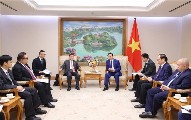 Deputy Prime Minister Tran Hong Ha receives Luo Bi Xiong, Chairman of the Board of Directors of the China Power Engineering Consulting Group Co., Ltd (CPECC). (Photo: VNA)