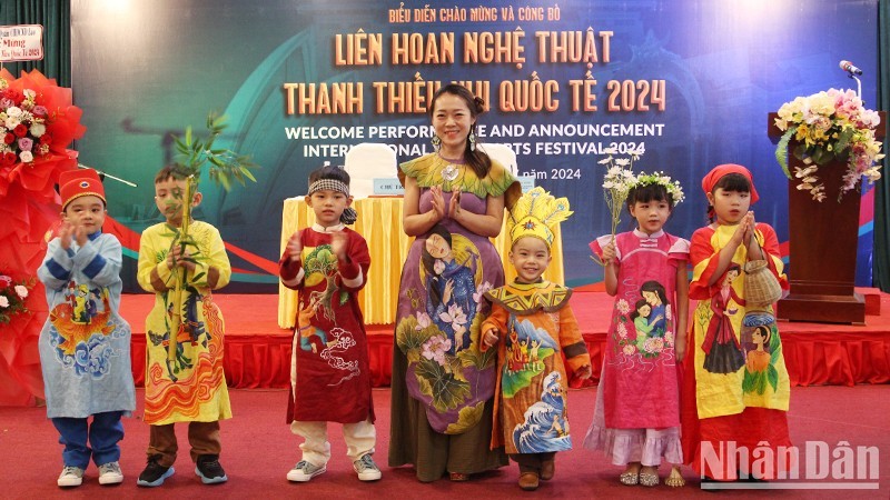 Children perform at the announcement of the international youth arts festival.