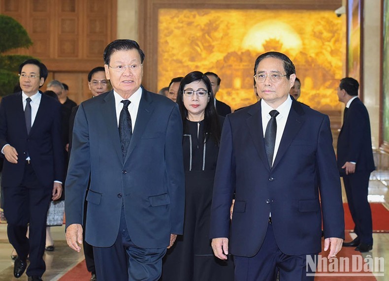 Prime Minister Pham Minh Chinh and General Secretary of the Lao People's Revolutionary Party and President of Laos Thongloun Sisoulith. (Photo: NDO)