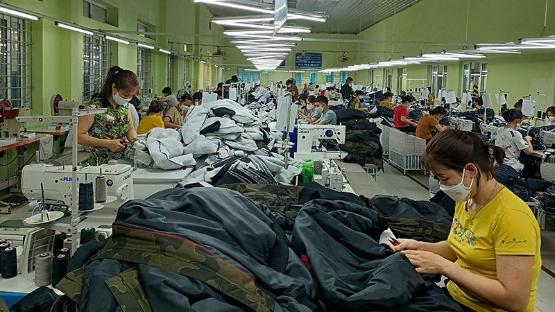 Manufacturing clothes for export at the Nam Dinh Textile Garment Corporation.