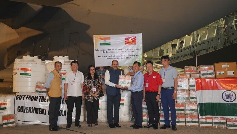 India hands over relief aid to Vietnam.