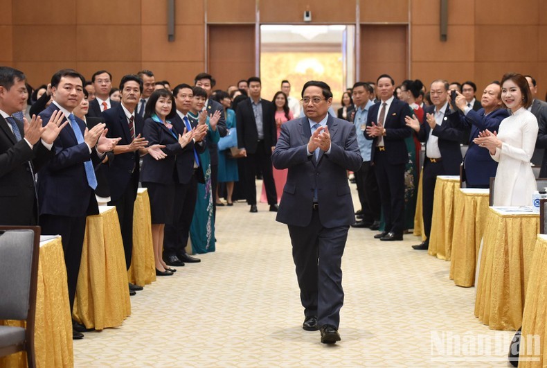 Prime Minister Pham Minh Chinh at the meeting with businesspeople in Hanoi on October 4. (Photo: Tran Hai)