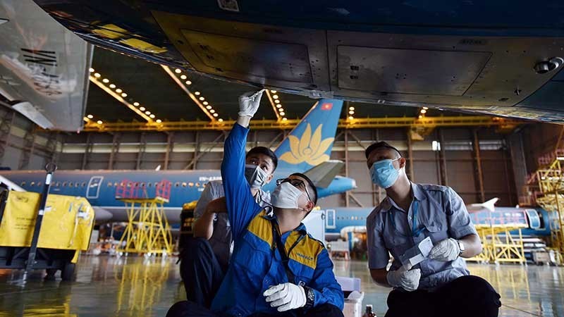 VAECO engineers inspect and repair aircraft at Noi Bai International Airport. (Photo: The Dai)