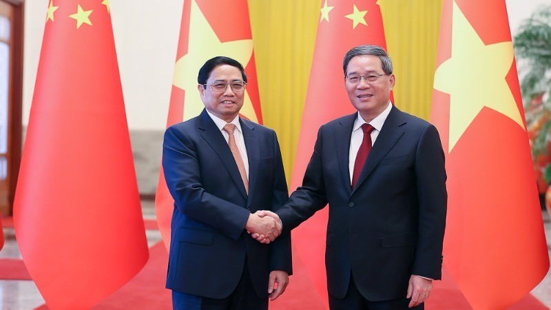 Vietnamese Prime Minister Pham Minh Chinh and Chinese Premier Li Qiang during the former's visit to China in June 2023. (Photo: VGP)