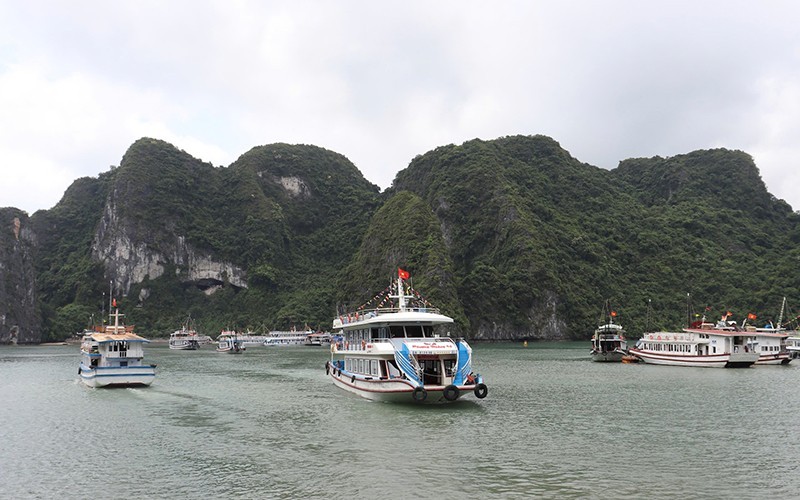 Ships take visitors back to Ha Long Bay after Typhoon Yagi.