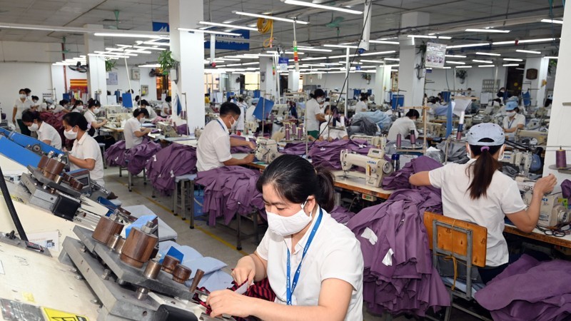 Manufacturing clothes at Garment 10 Corporation. (Photo: Dang Anh)