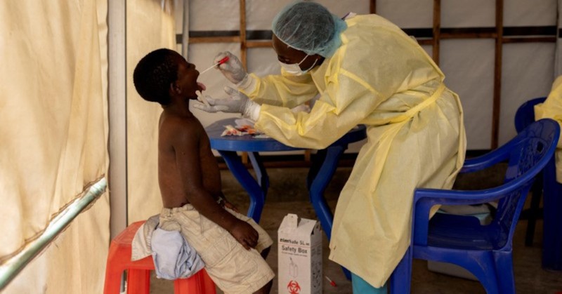 A laboratory nurse takes a sample from a child declared a suspected case mpox at a treatment centre in Munigi, North Kivu province, Democratic Republic of the Congo. (Photo: Reuters)