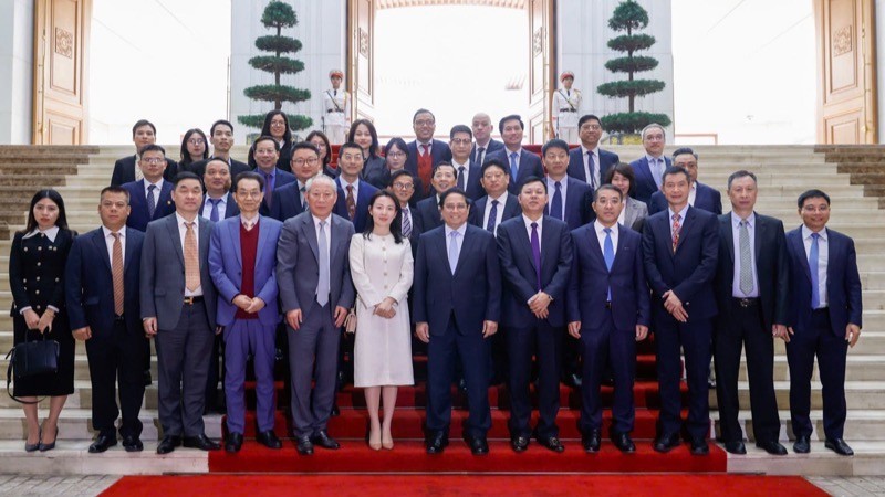 PM Pham Minh Chinh and Chinese business leaders. (Photo: Tran Hai)