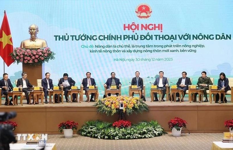 Prime Minister Pham Minh Chinh at a dialogue with farmers in 2023. (Photo: VNA) 