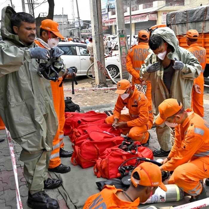 National Disaster Response Force personnel arrive to inspect the gas leak accident at a factory in Ludhiana. (Photo: AFP)