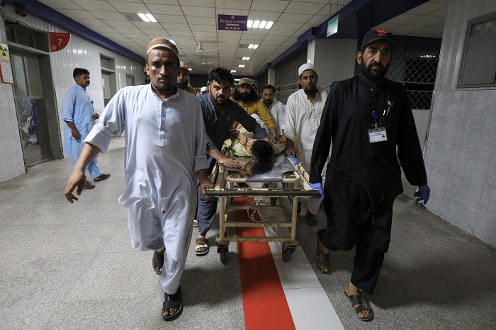 The death toll from the suicide attack at a political gathering in the Bajaur district of Pakistan's northwest Khyber Pakhtunkhwa province on Sunday jumped to 54 after more injured succumbed to their injuries, a police official said on Monday.