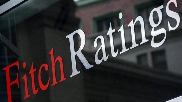 Fitch Ratings warned on Tuesday that dozens of U.S. banks, including JPMorgan, the largest bank in the country, could be at risk of sweeping rating downgrades.