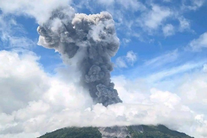 Indonesia's Mount Ibu volcano erupted on Tuesday, spewing thick columns of grey ash five km (three miles) into the sky, the volcanology agency said, but there were no immediate reports of evacuations.