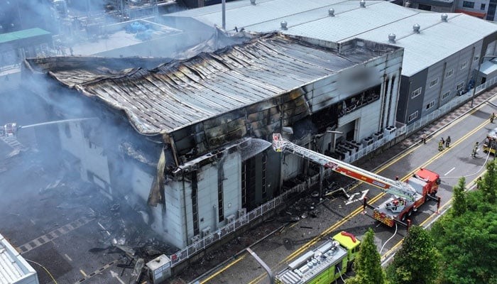 A fire broke out at a lithium battery factory in South Korea on Monday, killing at least 16 people and five others remain missing, local fire officials said. This photo shows an aerial view of firefighters working to extinguish a fire at a lithium battery factory in Hwaseong, South Korea on June 24, 2024. (Photo: AFP)