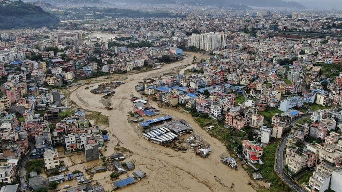 Nepal has shut schools for three days after landslides and floods triggered by two days of heavy rain across the Himalayan nation killed 129 people, with 62 missing, officials said on Sunday.