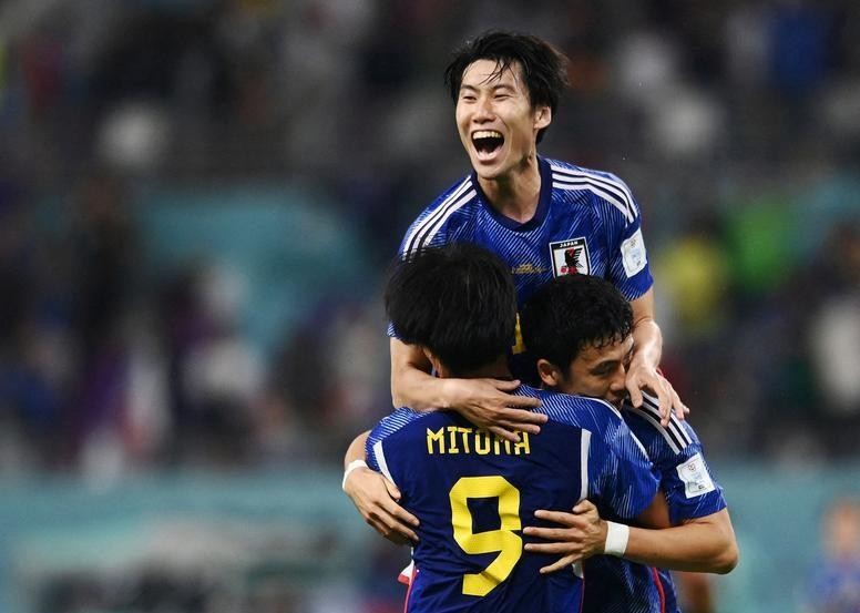 Japan's Kaoru Mitoma, Wataru Endo and Yuto Nagatomo celebrate after their match against Germany. (Photo: Reuters)