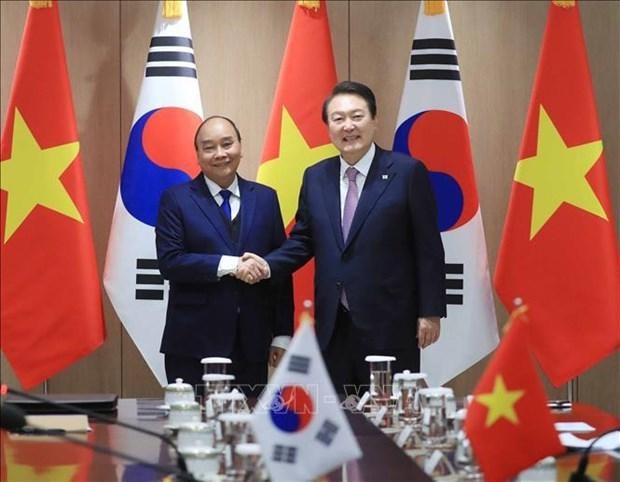  President Nguyen Xuan Phuc (L) and President of the Republic of Korea (RoK) Yoon Suk-yeol (Photo: VNA)