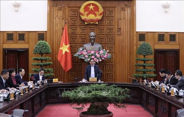 PM Pham Minh Chinh addresses the meeting in Hanoi on December 6. (Photo: VNA)