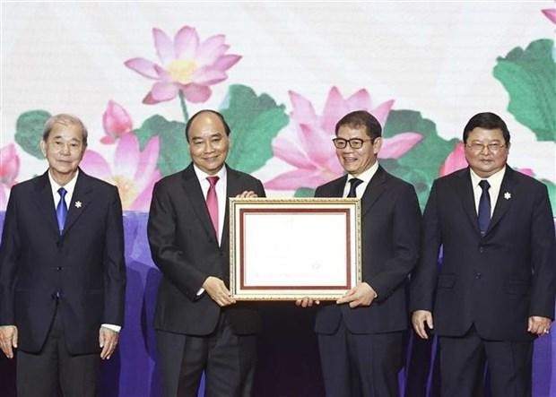 President Nguyen Xuan Phuc lauds Truong Hai Group Corporation (THACO), a multi-industry holding corporation, for its contributions to national economic development.(Photo: VNA)