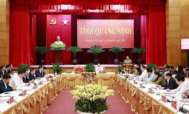 The meeting between PM Pham Minh Chinh and Quang Ninh officials on February 12. (Photo: VNA)