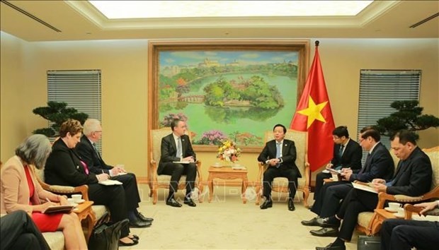 Deputy Prime Minister Tran Hong Ha (right) and GEAPP CEO Simon Harford at the meeting. (Photo: VNA)